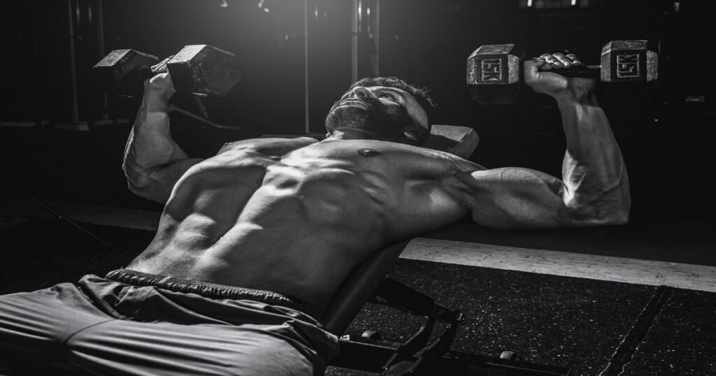 a man doing incline dumbbell bench press