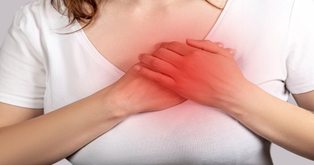 a woman suffering from chest pain