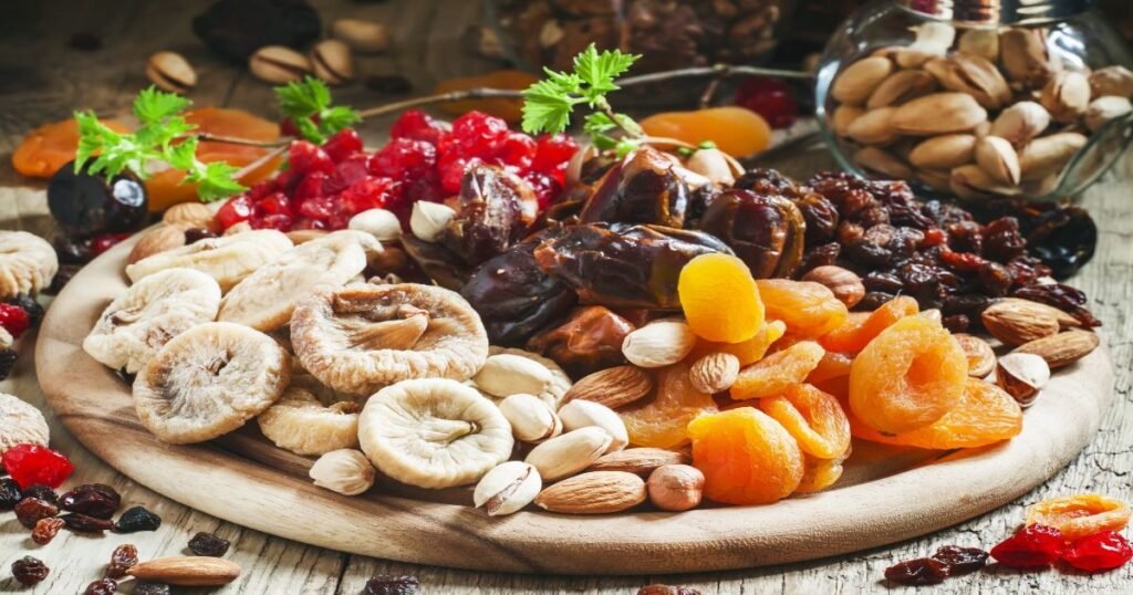 A mix of dried fruits including apricots, figs, and raisins.