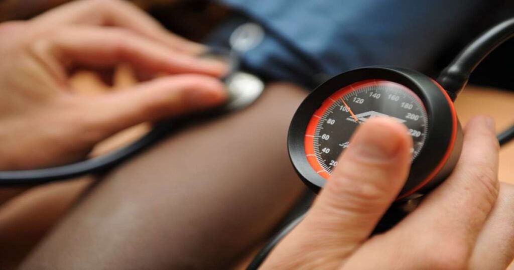 Measuring blood pressure.