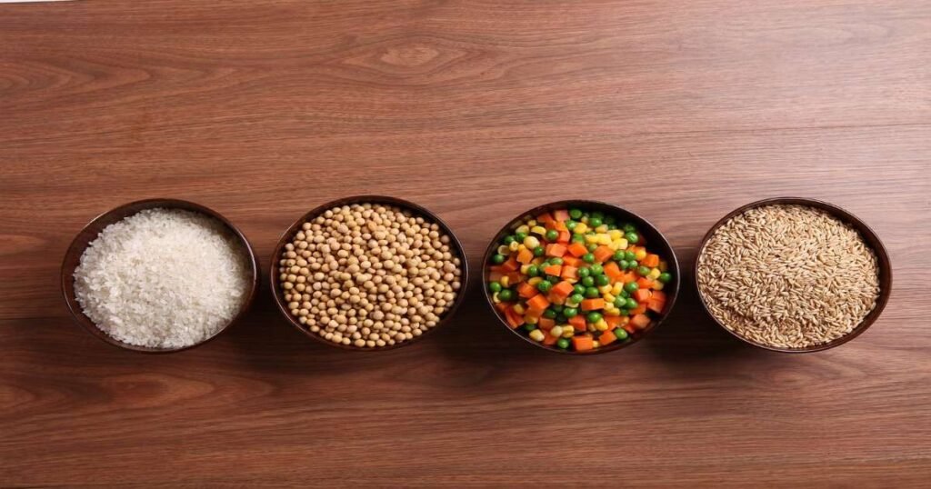 different variety of whole grains in bowls